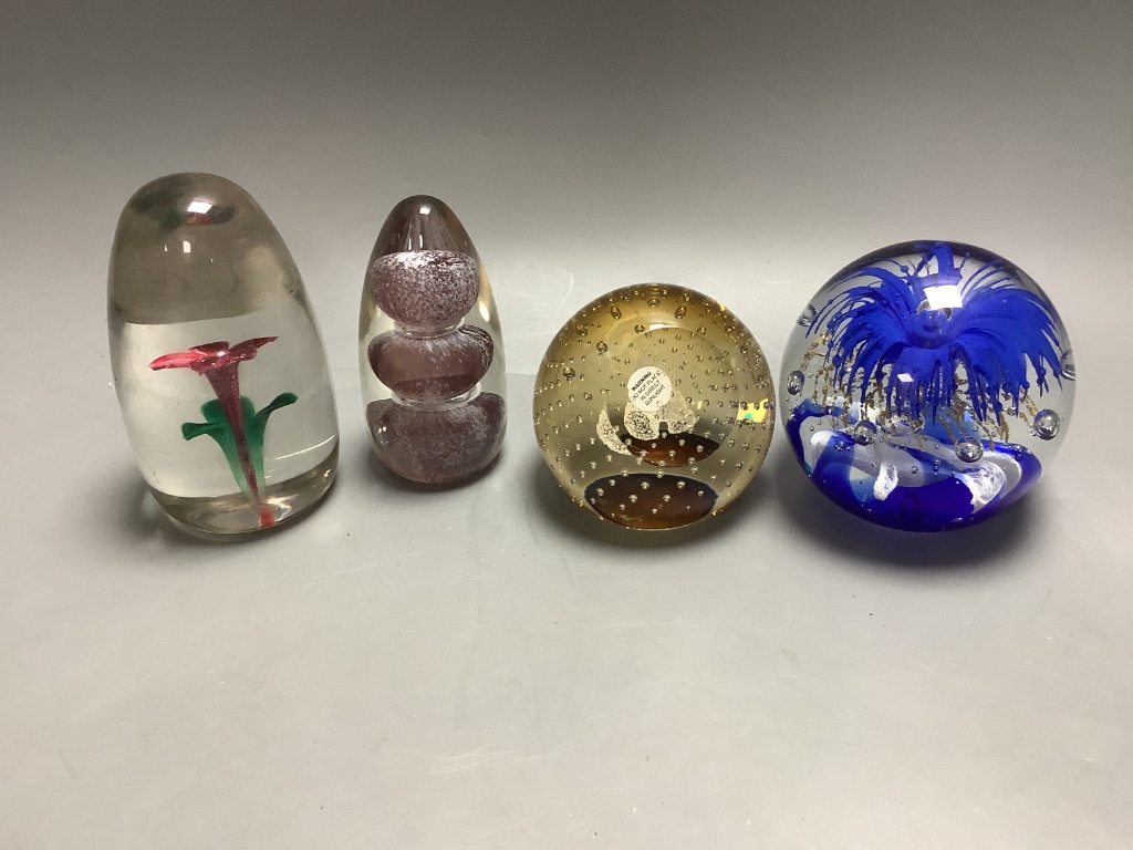 Eleven glass paperweights